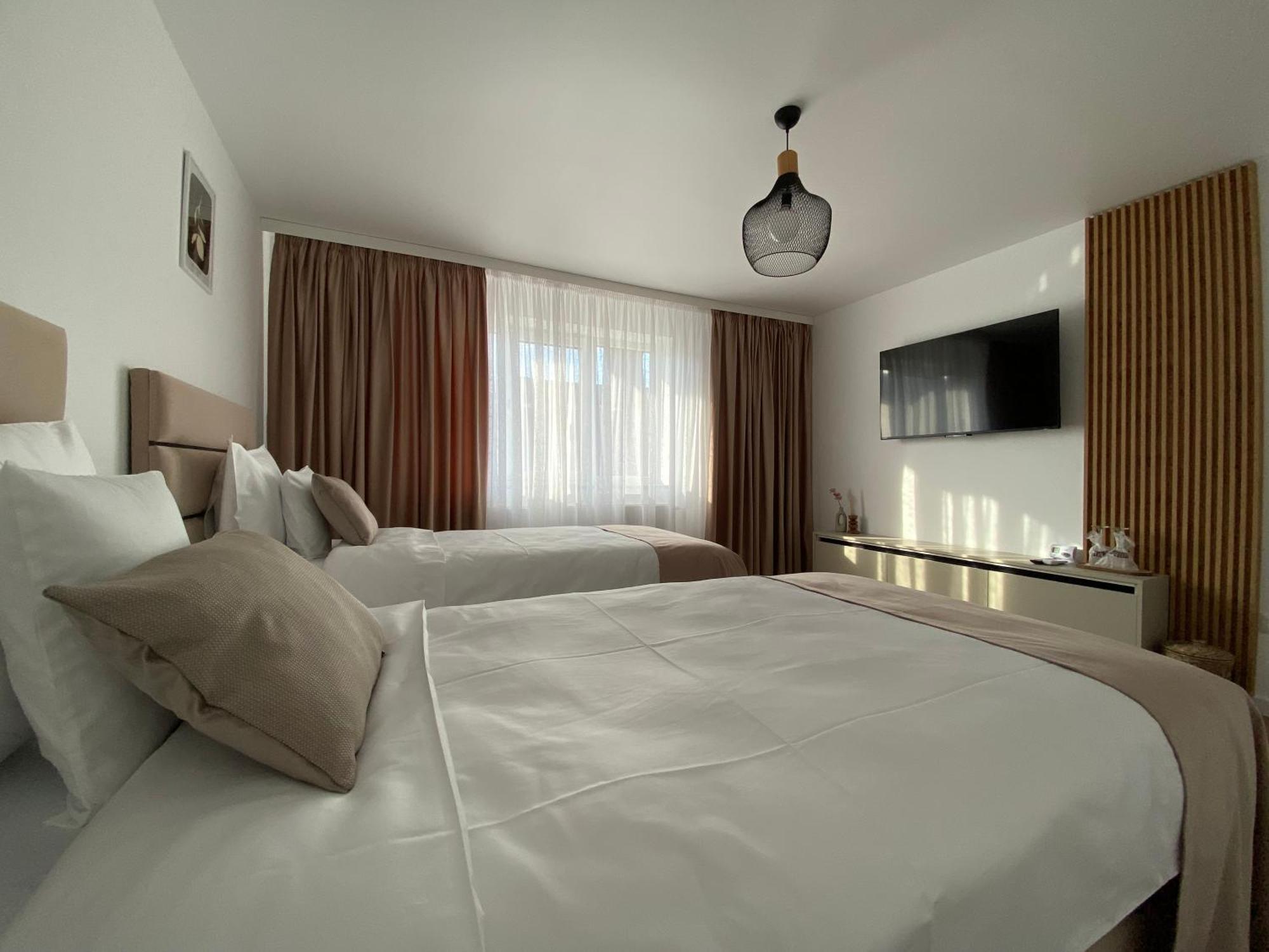 Cosy Apartments & Bistro Pufesti Esterno foto