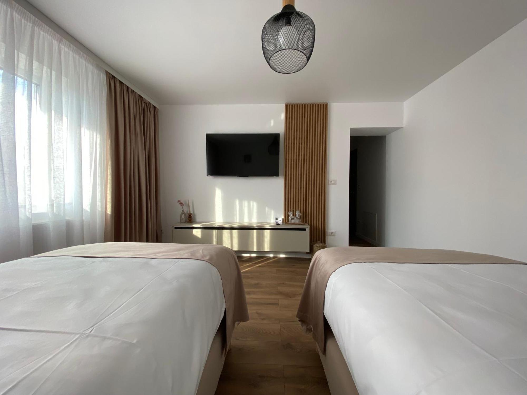 Cosy Apartments & Bistro Pufesti Esterno foto
